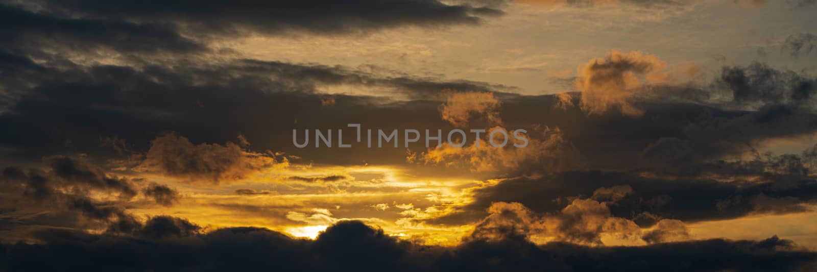 Panoramic view of dramatic clouds rising of sun floating in sky to change weather. Soft focus, blurred motion. Soft focus, motion blur sky majestic meteorology cloudscape.