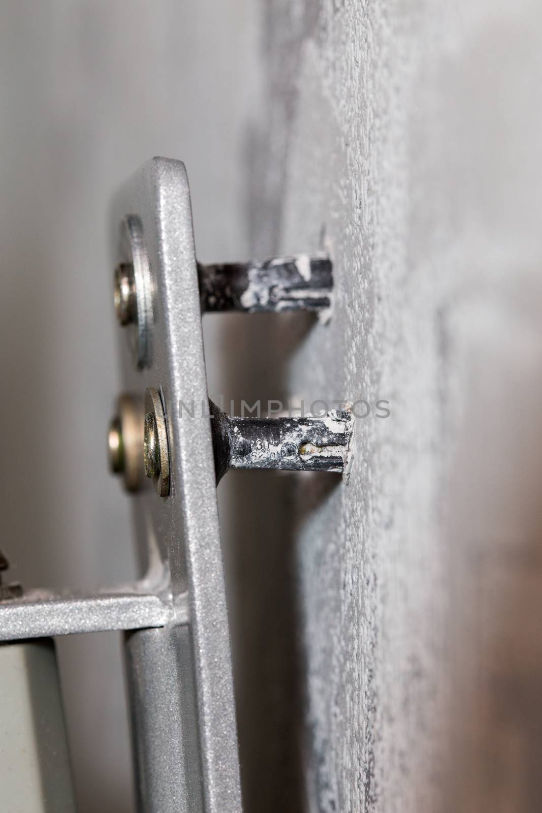 weak plastic dowels come out from wall and monitor or tv moun.