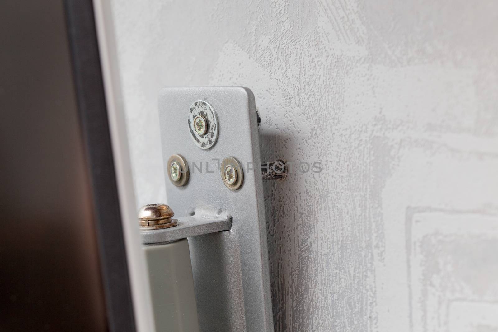 weak plastic dowels come out from wall and monitor or tv moun.
