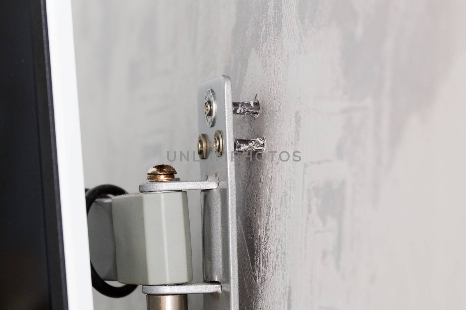 weak plastic dowels come out from wall and monitor or tv moun.