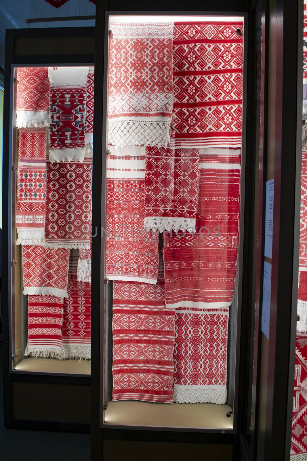 texture of towels embroidered with the national red and white at the fair of folk crafts, collection, Belarus