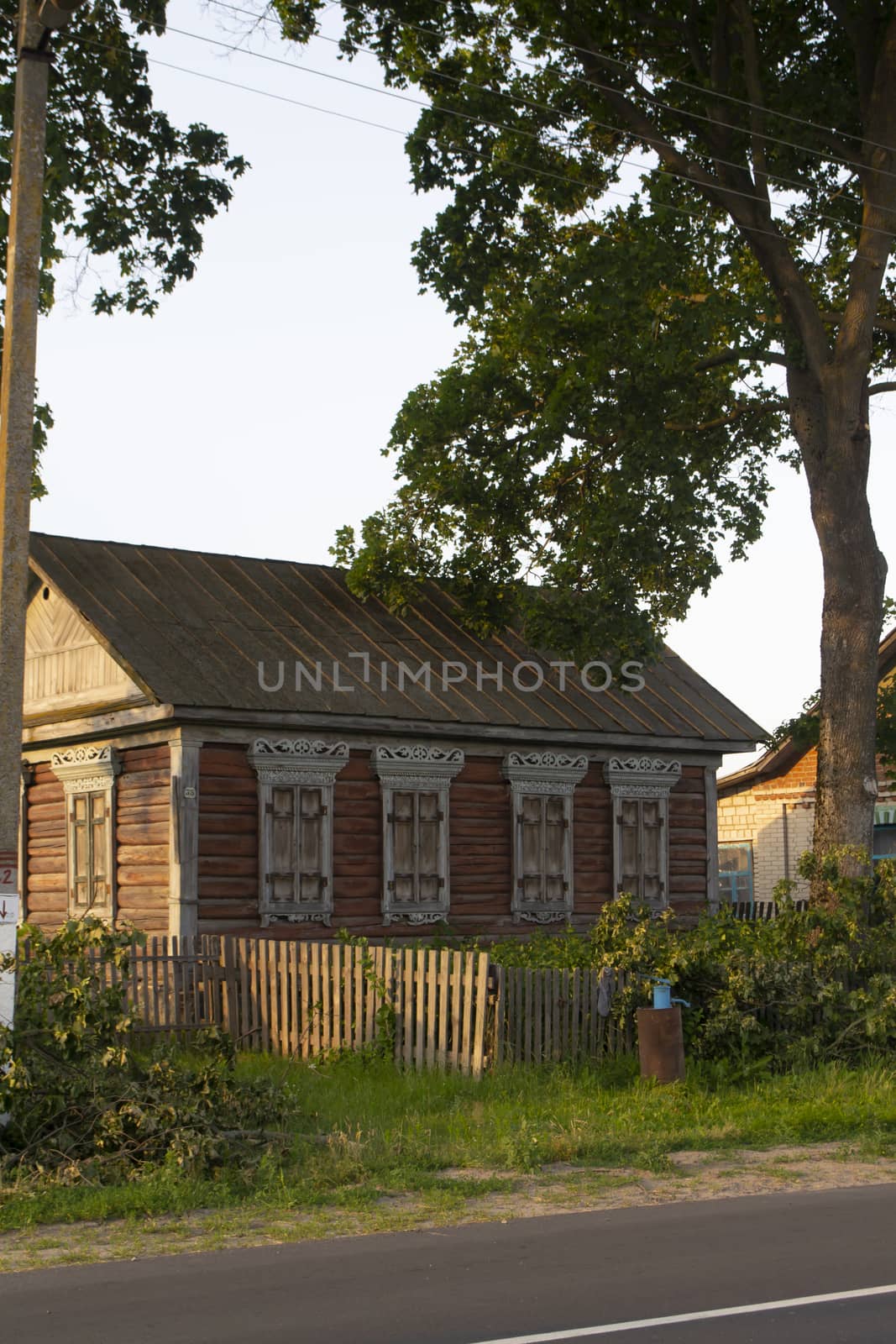 ornate facade of old traditional wooden house, vertical image