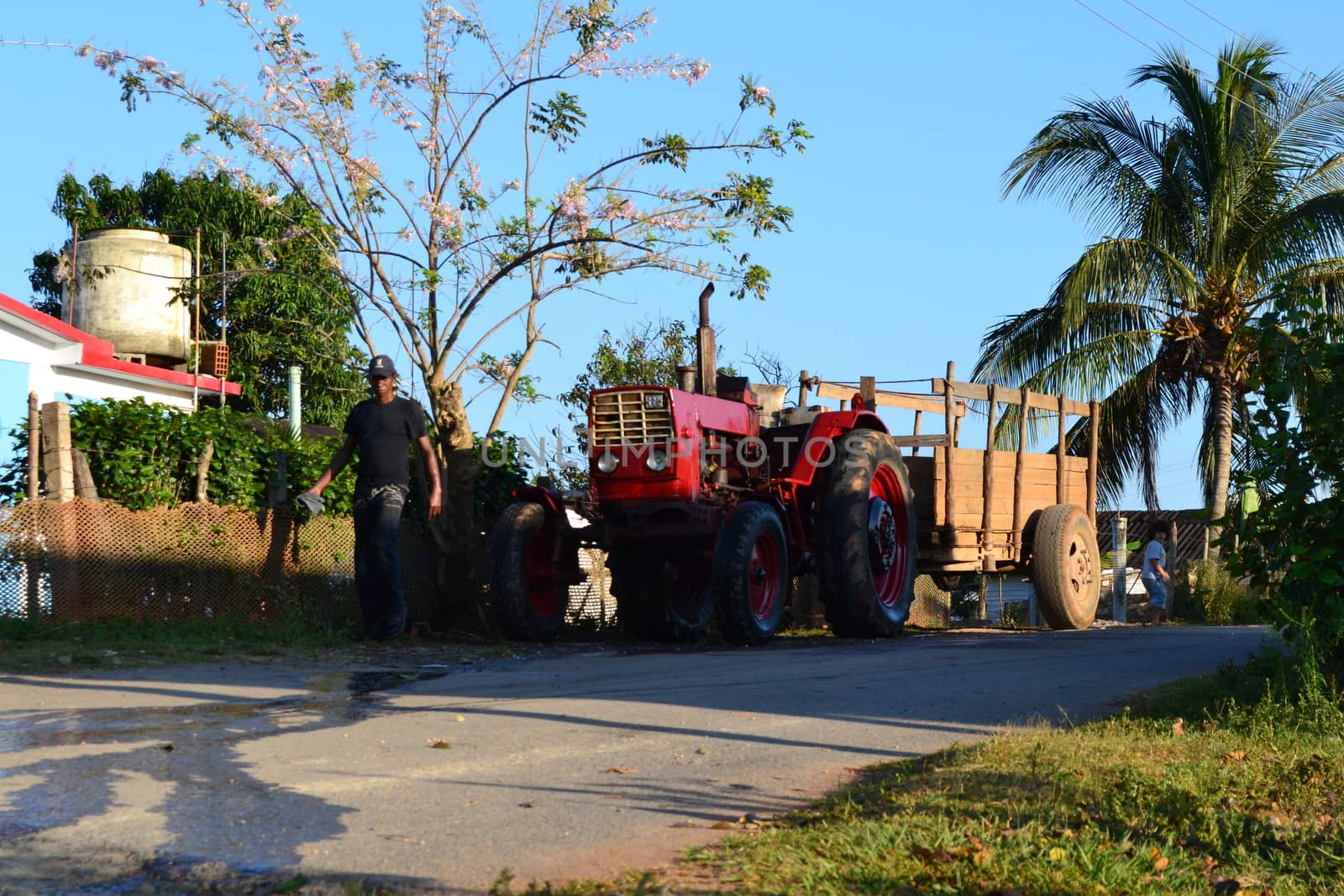 Vinales, Cuba, Mach 2011: Old tractor of a farmer in the streets of Vinales, Cuba