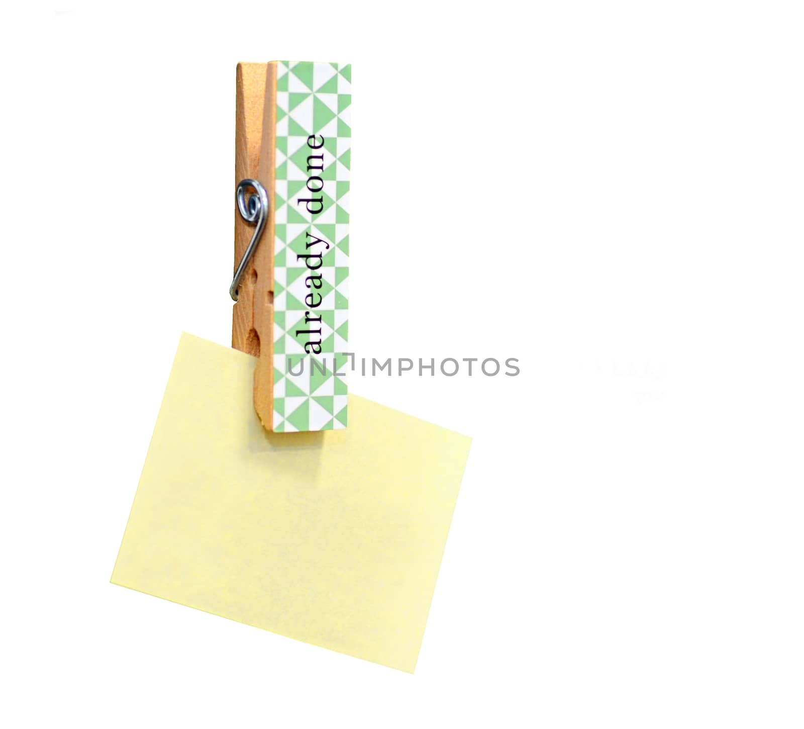 Yellow stick note paper pinned on wooden peg isolated on white background. Copy space for other notes on right side.