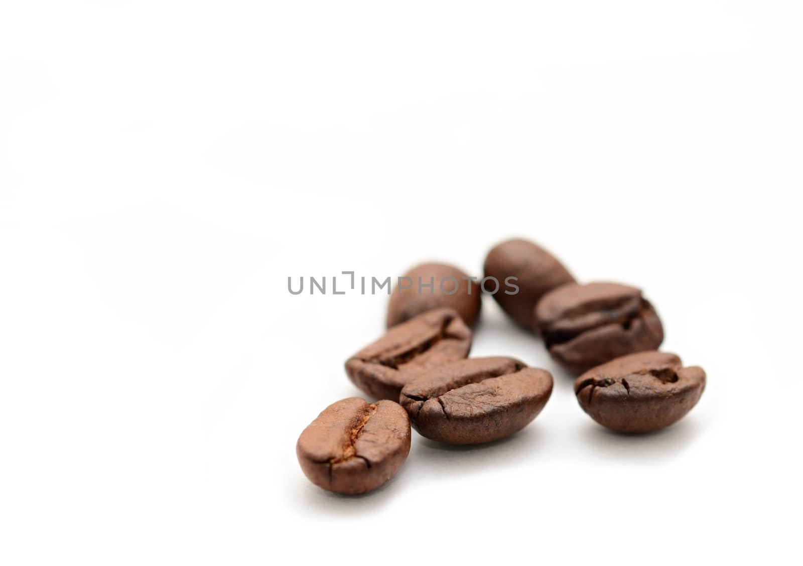 Coffee beans on white background. by hamik