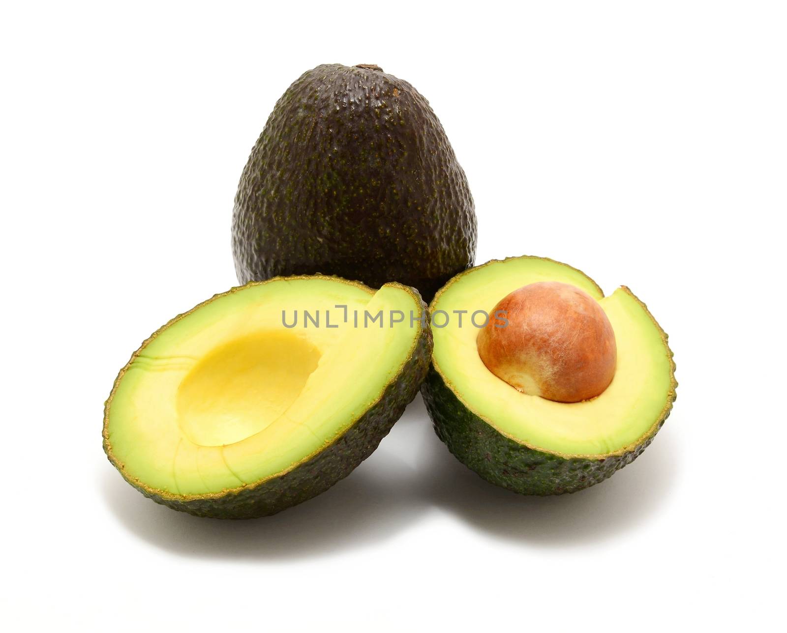 Two avocado over white background. by hamik