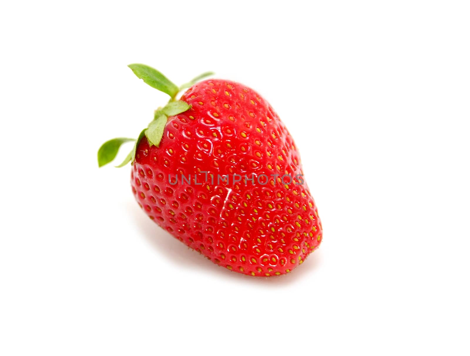 Closeup of single fresh juicy strawberry over white background.