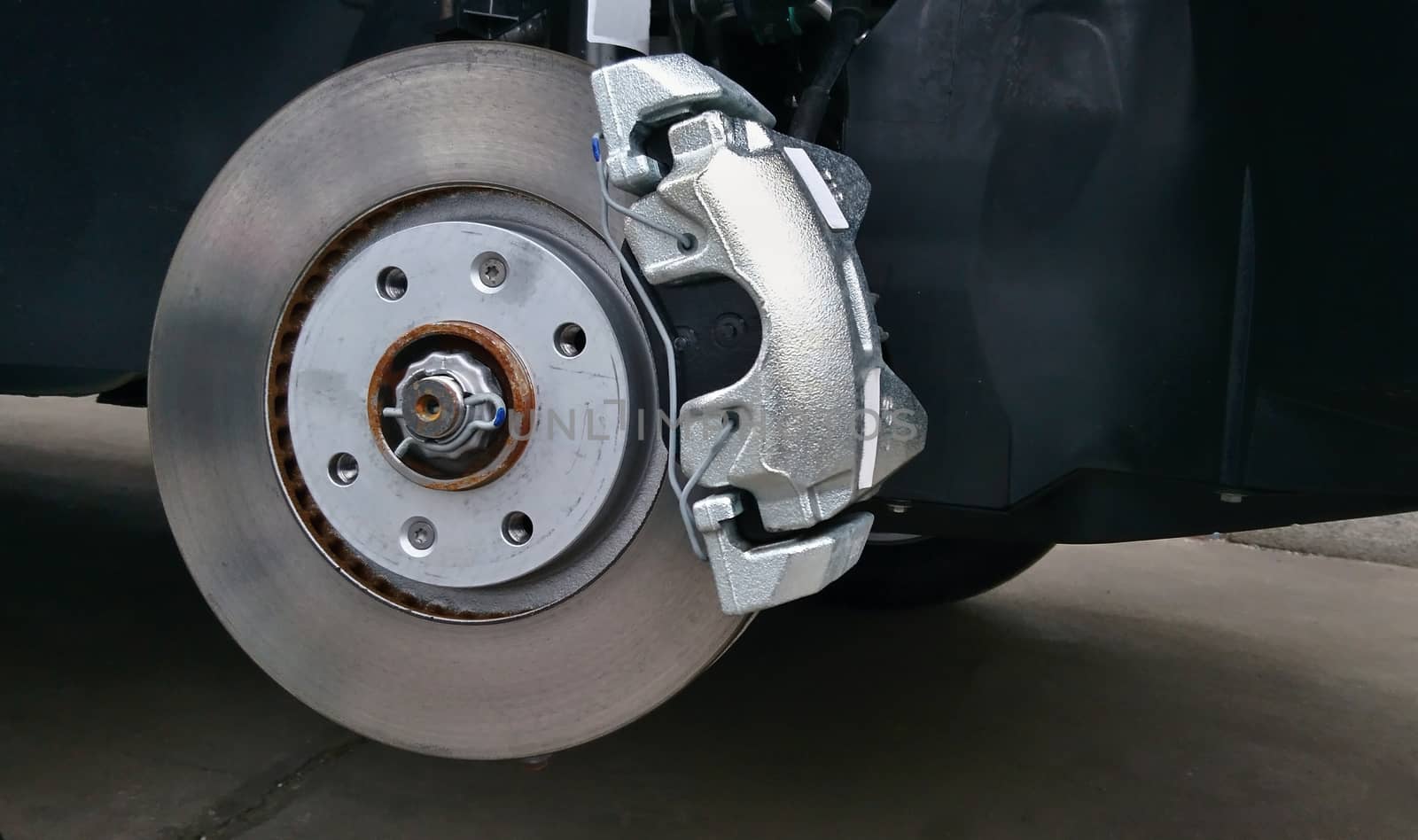 Close-up of a car disc brake by hamik