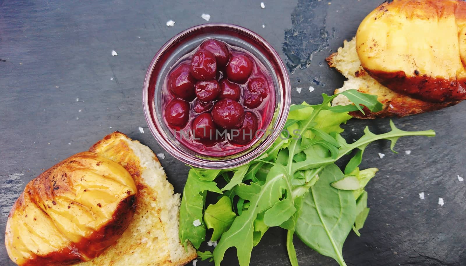 Grilled Slovak sheep cheese Ostiepok with cranberries and roasted bread.