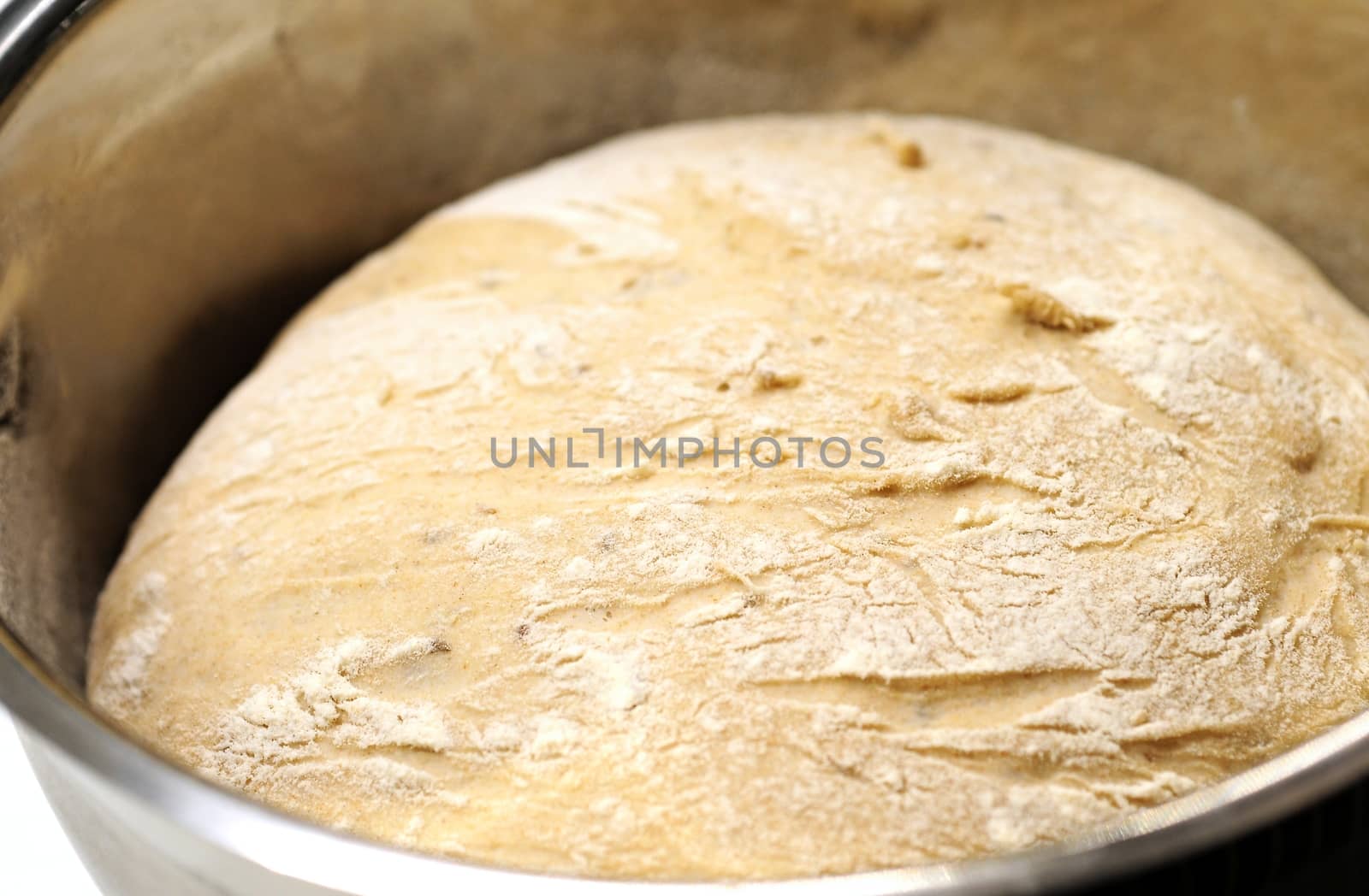 Yeast dough in bowl by hamik