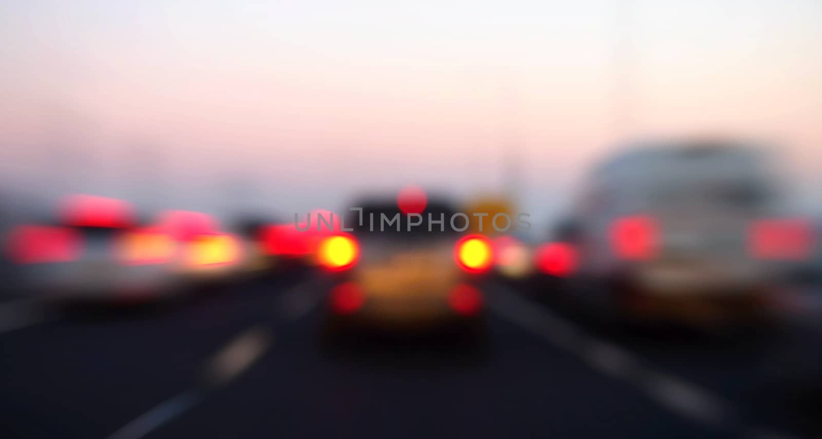 Blurred lights of cars in motion by hamik