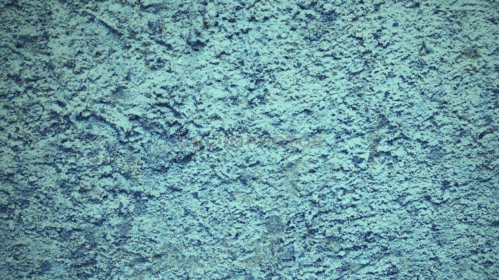 Blue grunge background with concrete texture.