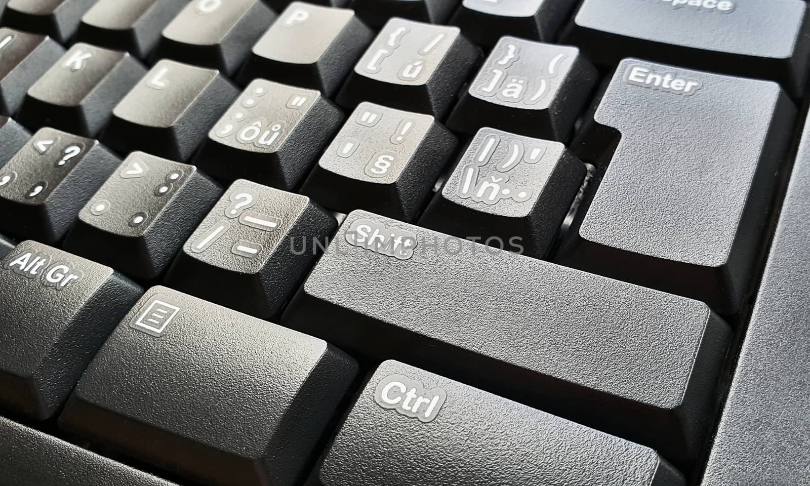 Black keyboard keys closeup by hamik