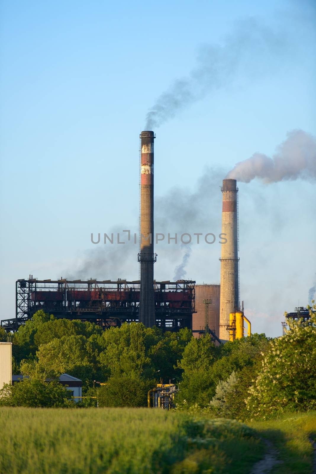 Chimney of a Power plant against blue sky