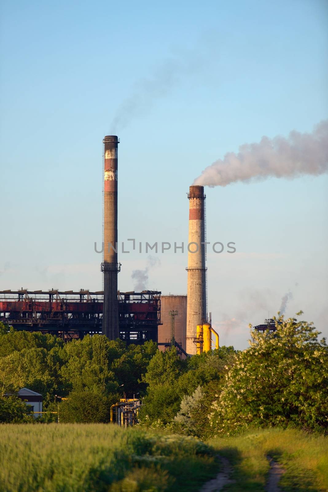 Chimney of a Power plant against blue sky