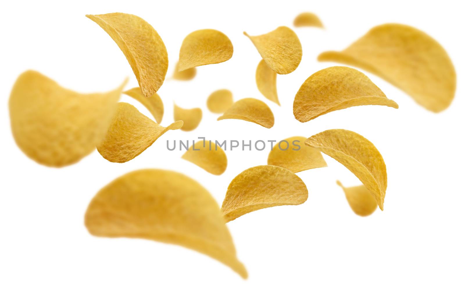 Potato chips levitate on a white background.
