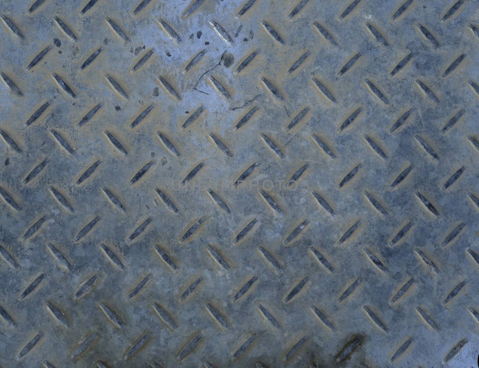 old rusty metal manhole cover abstract background