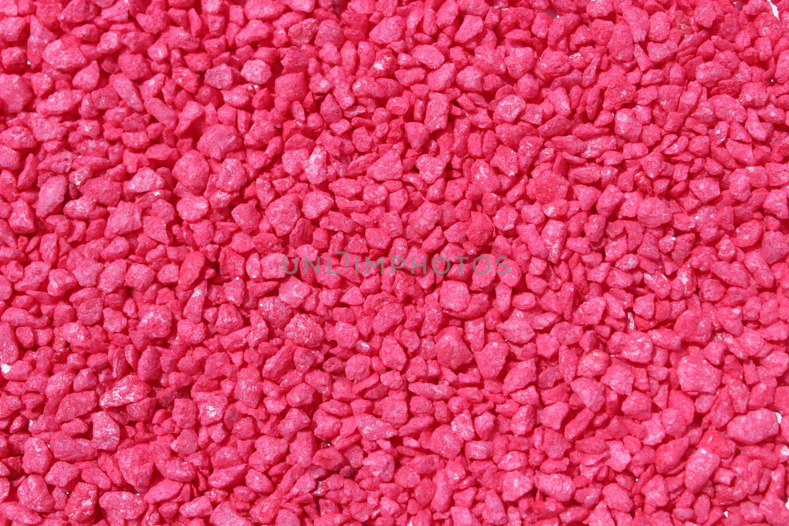 The picture shows a background with red decoration granules