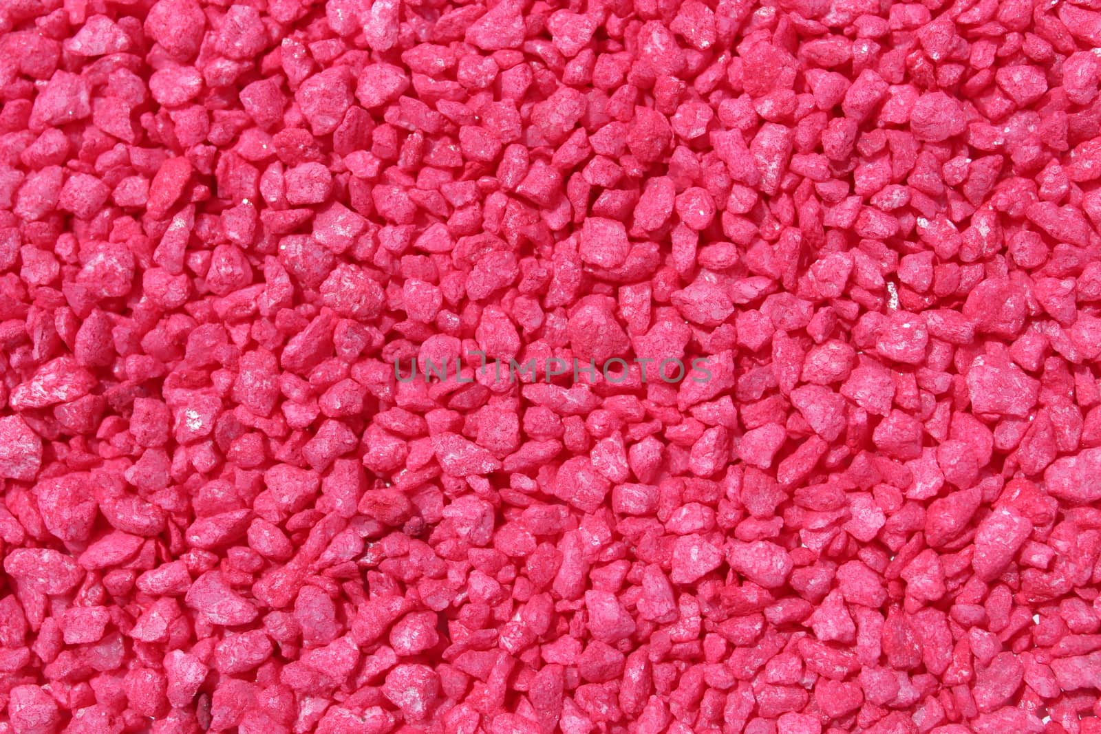 The picture shows a background with red decoration granules