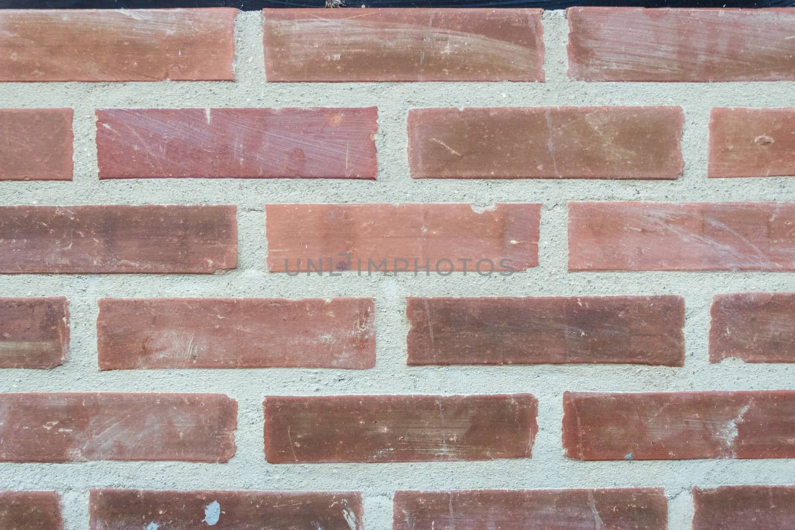 Brick wall outside a house with a vintage looking