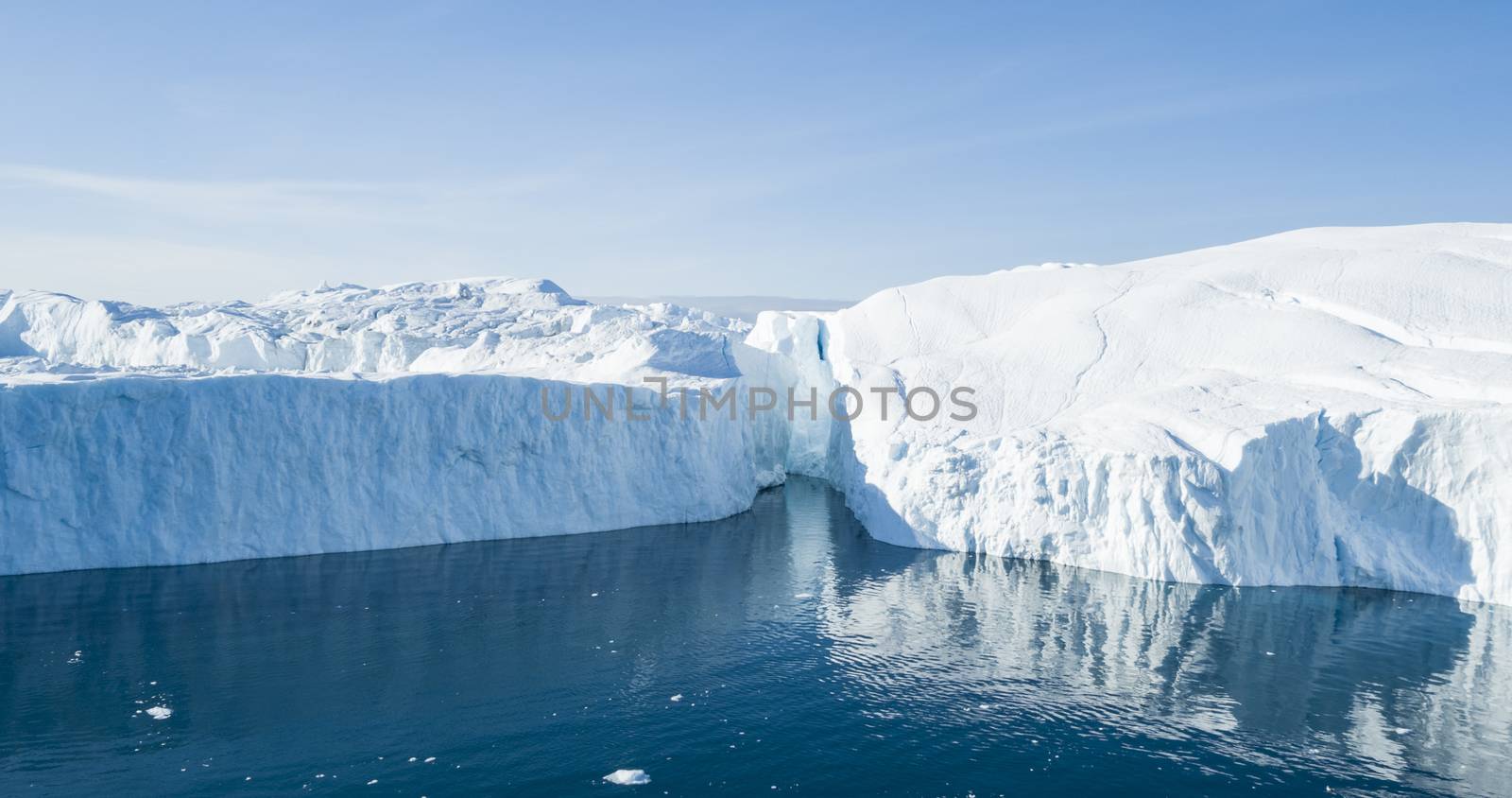 Global Warming and Climate Change - Icebergs from melting glacier on Greenland by Maridav