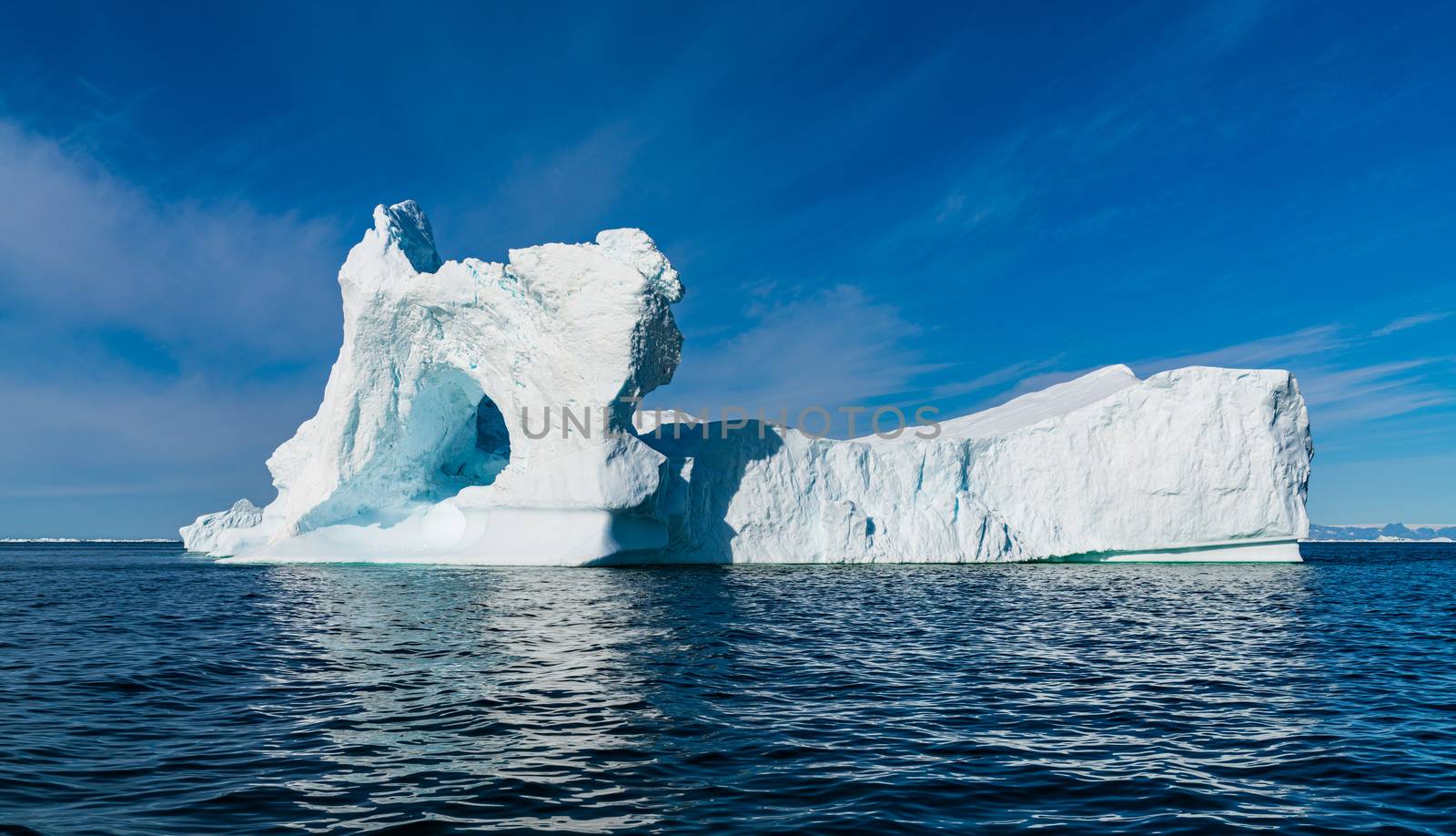Climate Change and Global Warming Concept. Icebergs from melting glacier in icefjord in Ilulissat, Greenland. Photo of arctic nature ice landscape.