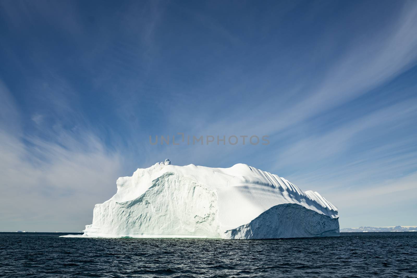 Iceberg from glacier in arctic nature landscape on Greenland. Icebergs in Ilulissat icefjord. Affected by climate change and global warming by Maridav