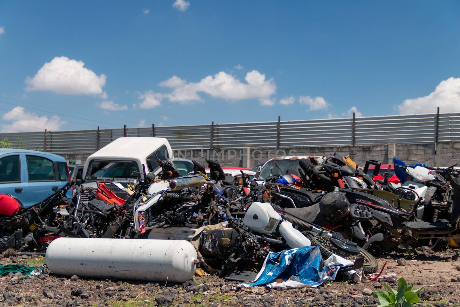 Old damaged cars on the junkyard waiting for recycling in Mexico City. Mexico