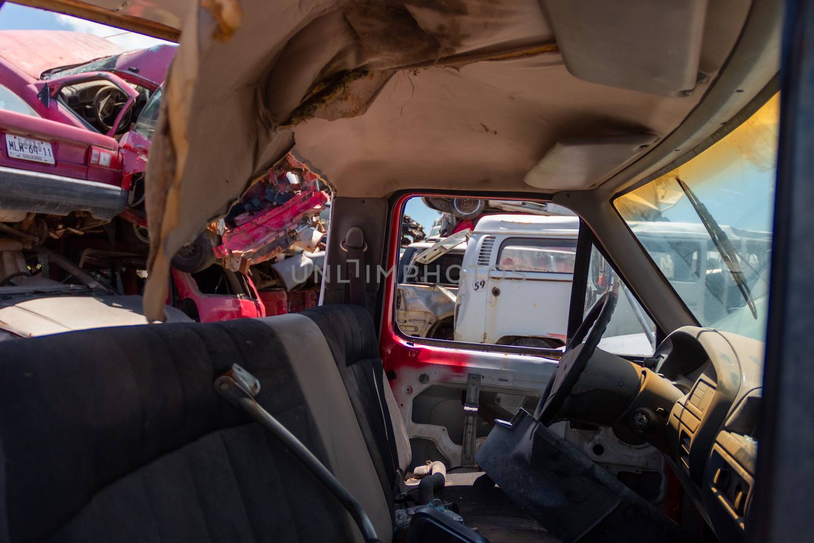 Old damaged cars on the junkyard waiting for recycling in Mexico City. Mexico