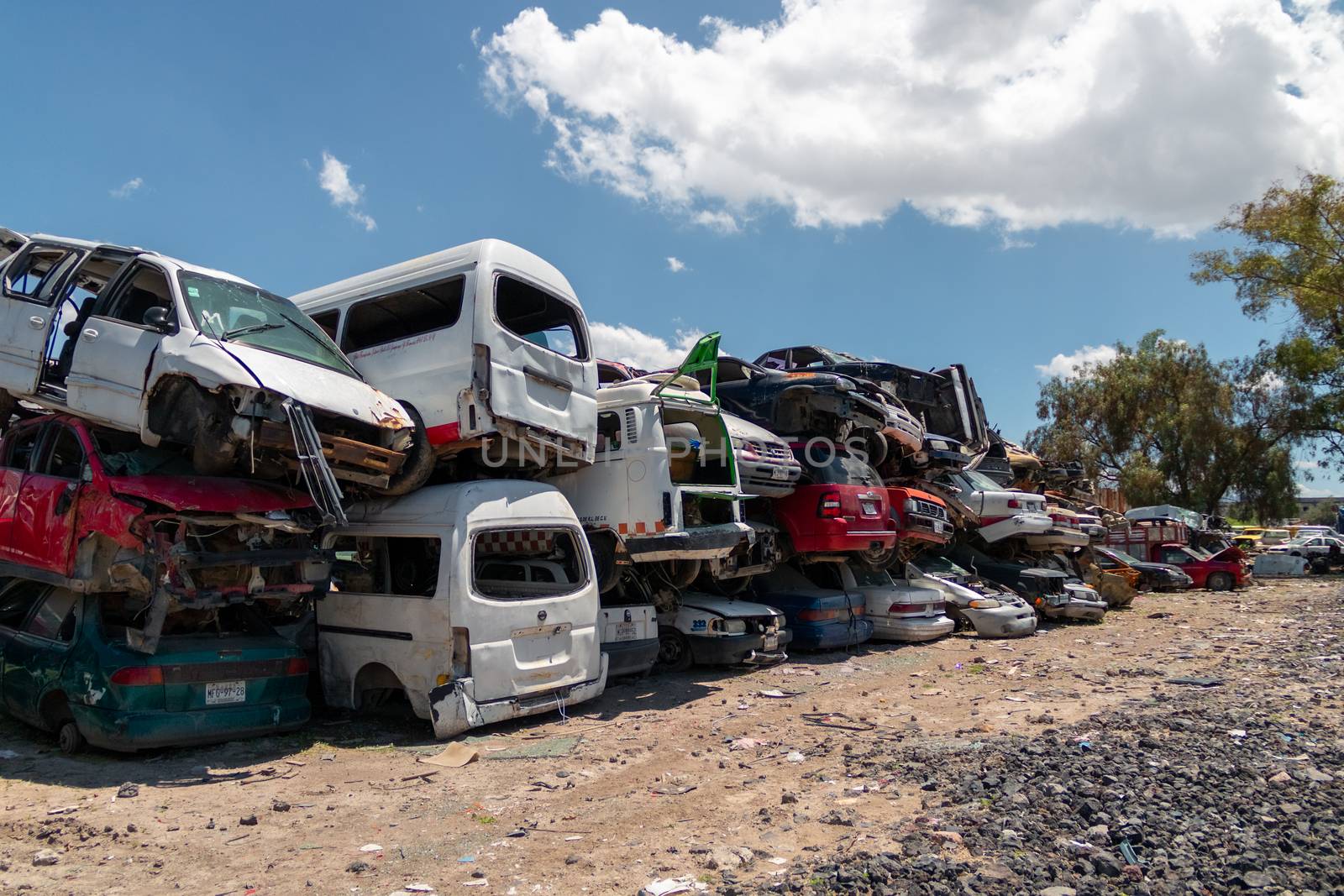 Old damaged cars on the junkyard waiting for recycling in Mexico City. Mexico