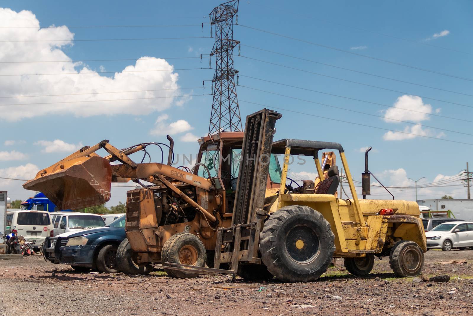 Old damaged cars on the junkyard waiting for recycling in Mexico City. Mexico