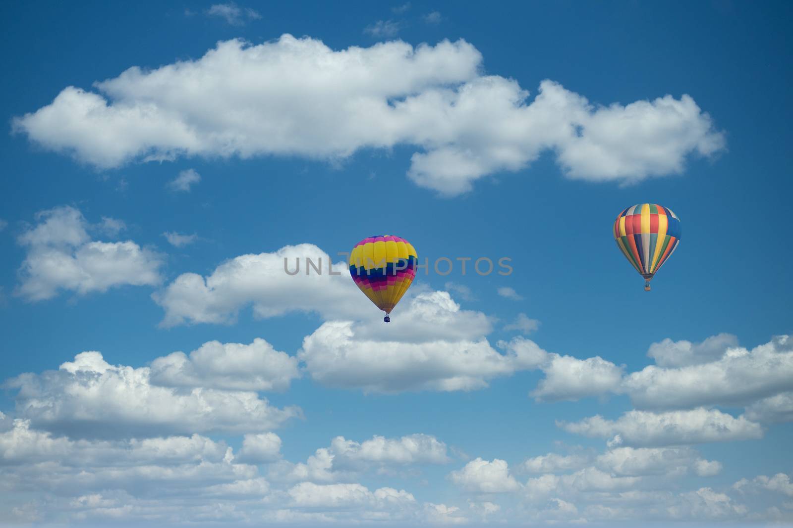 Two Hot Air Balloons on Blue Sky by dbvirago