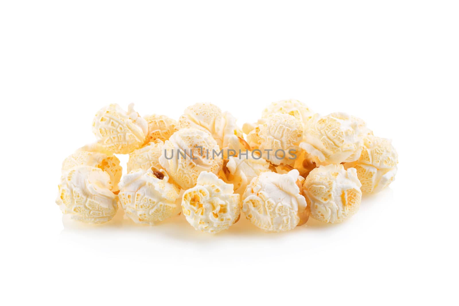 close-up popcorn isolated on a white background by kaiskynet