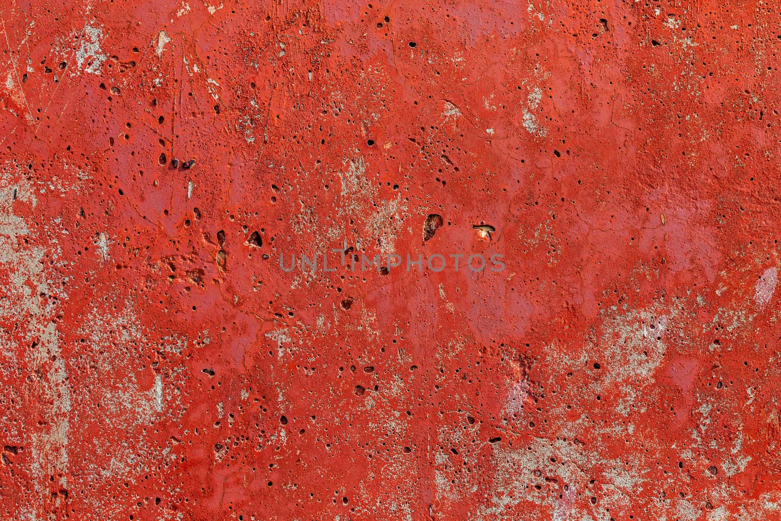 monocolor orange painted flat concrete surface closeup texture.