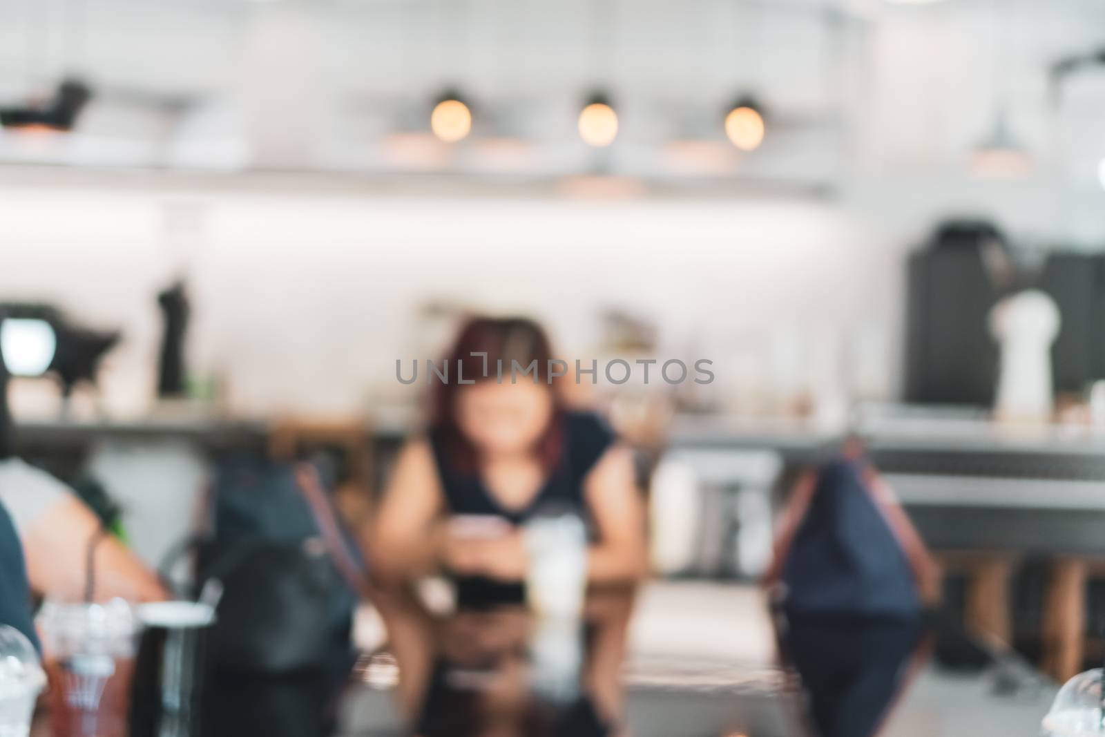 Blur coffee cafe with customers background vintage tone color style. by Suwant