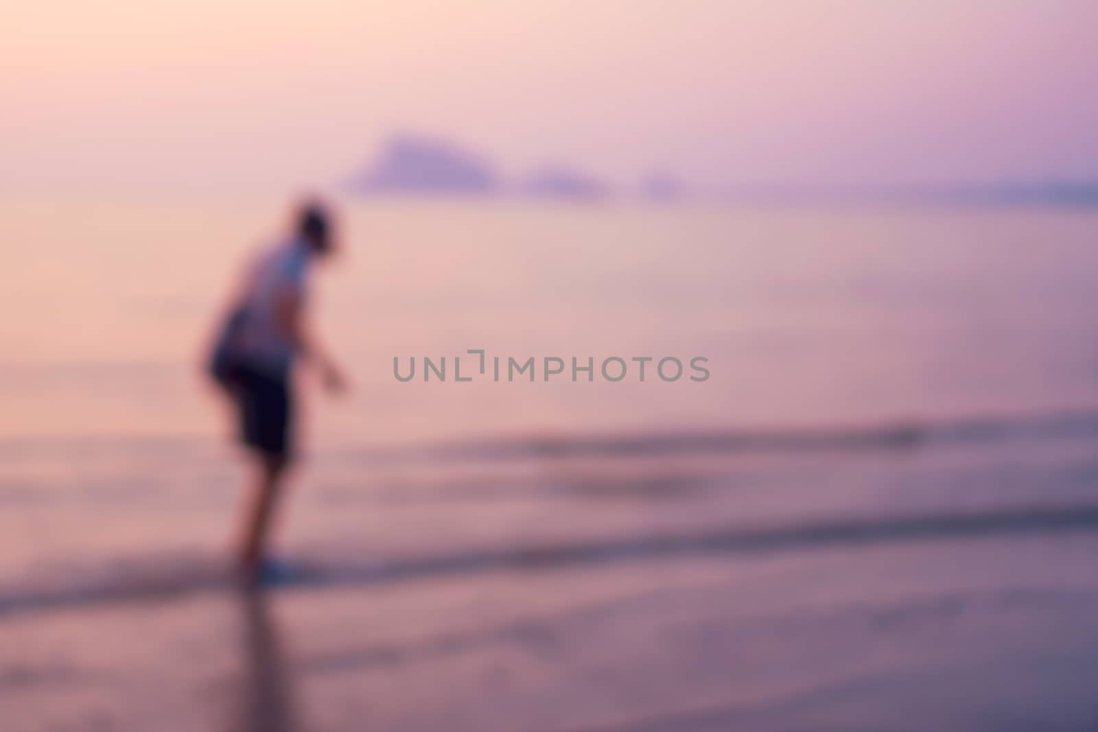 Tropical nature clean beach and white sand in summer with sun light blue sky and bokeh abstract  background.