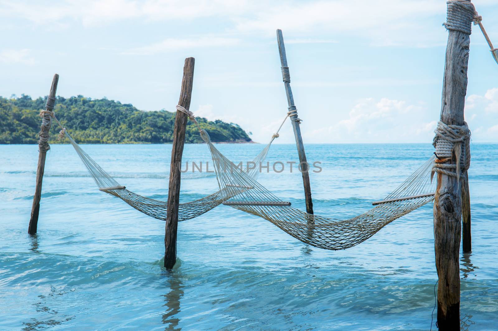 Cot for relaxing at the sea with freshness of nature.