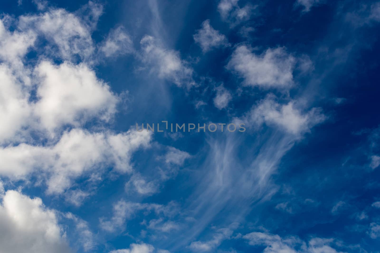 mixed clouds closeup telephoto shot with polarizing effect