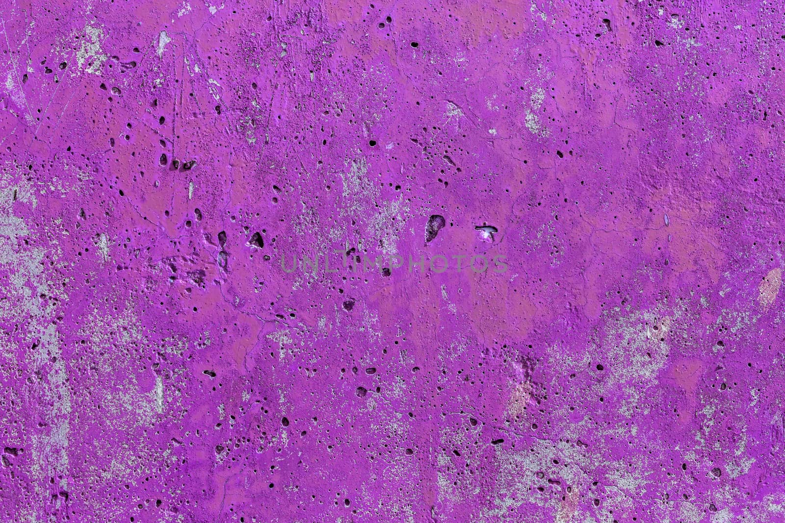 monocolor pink painted flat concrete surface closeup texture.