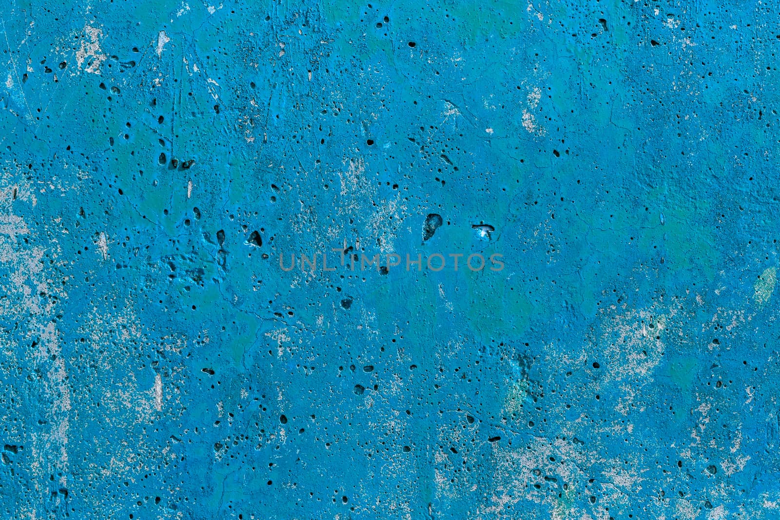 monocolor blue painted flat concrete surface closeup texture.