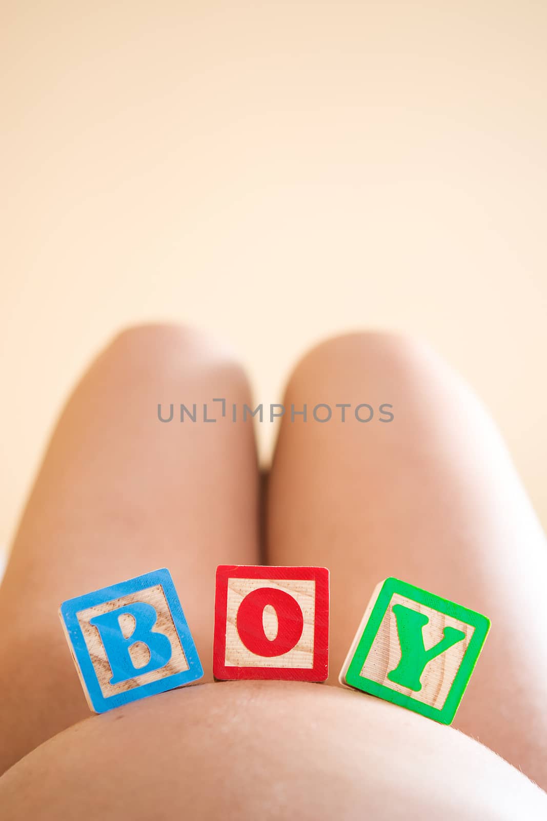 Pregnant woman with boy word on her belly by chandlervid85