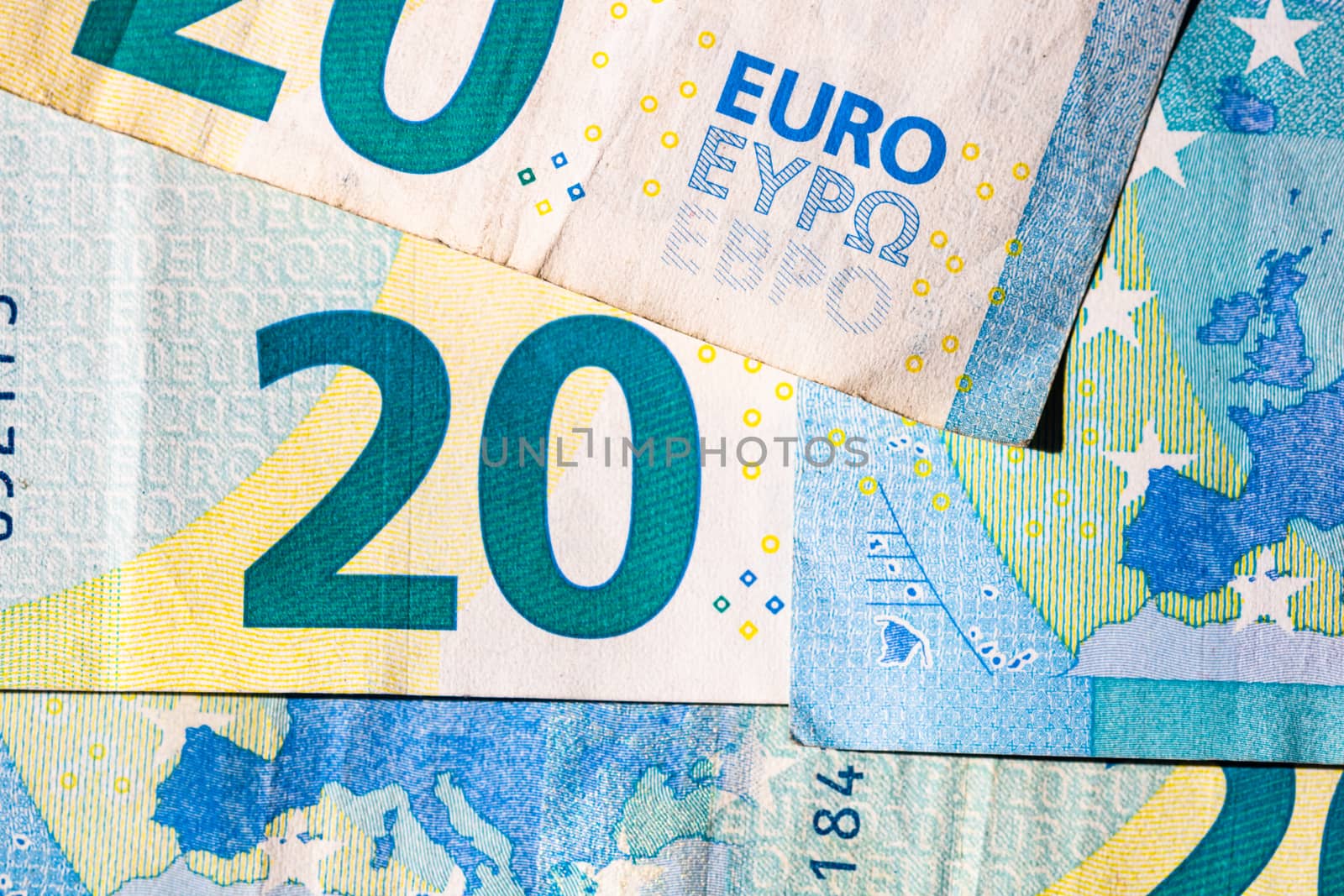 Selective focus on detail of euro banknotes. Close up macro deta by vladispas