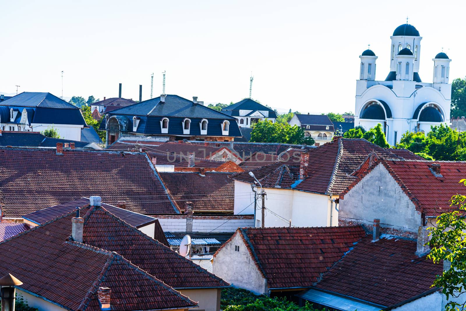 Overview of tile rooftops of old houses. Old buildings architect by vladispas