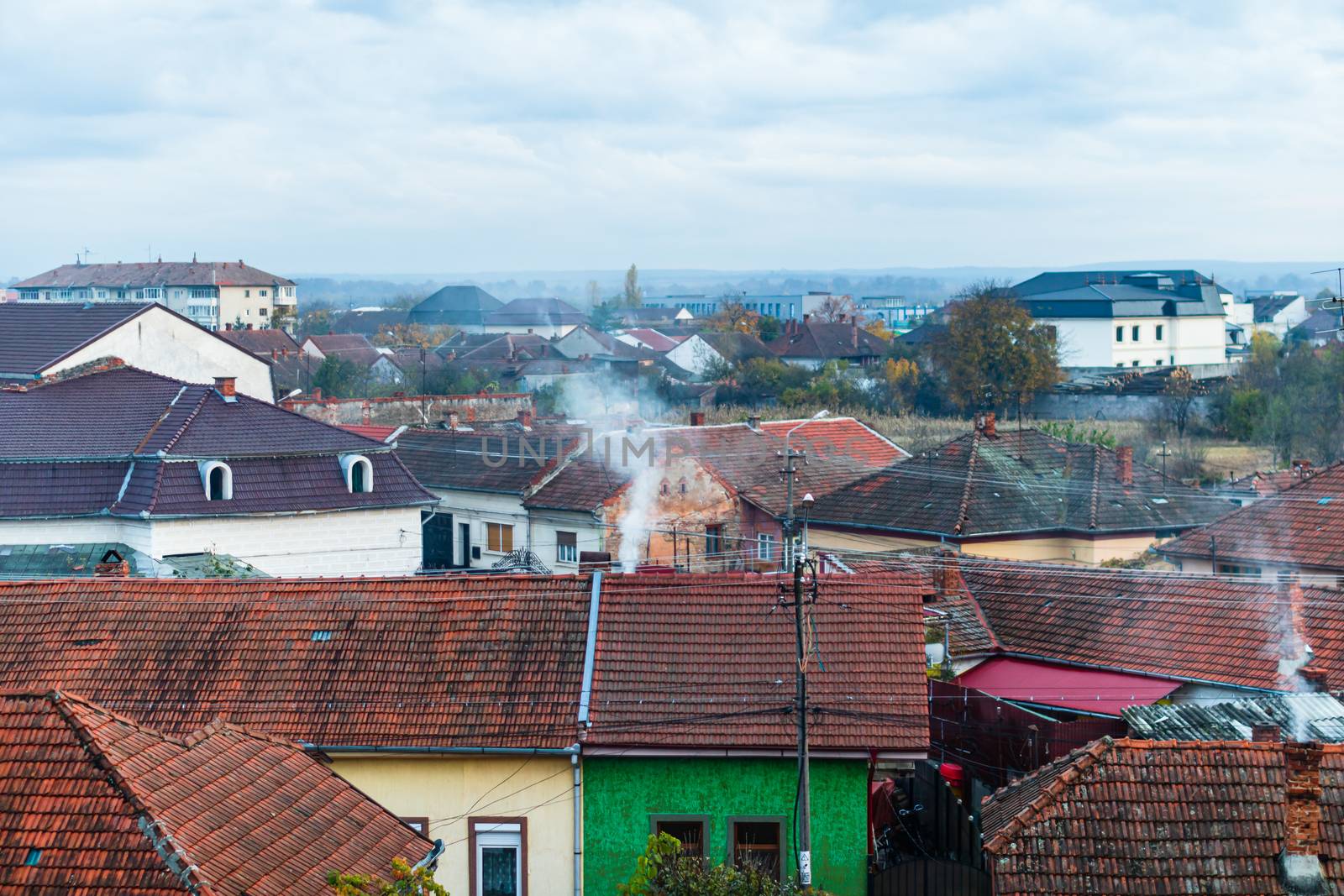 Overview of tile rooftops of old houses. Old buildings architect by vladispas