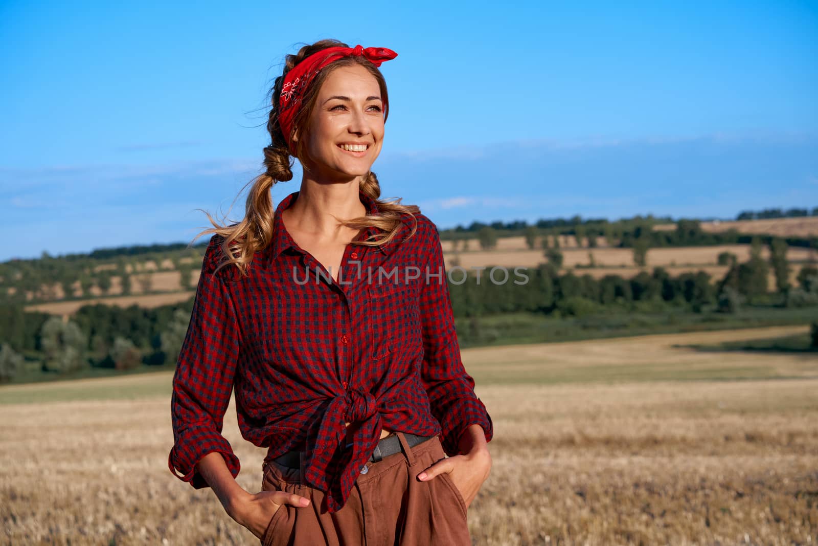 Woman farmer standing farmland smiling Female agronomist specialist farming agribusiness Happy positive caucasian worker agricultural field by andreonegin