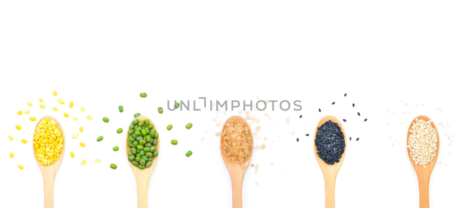 Grains Mung bean, White and Black sesame seeds, Brown sugar in wooden scoop on white background