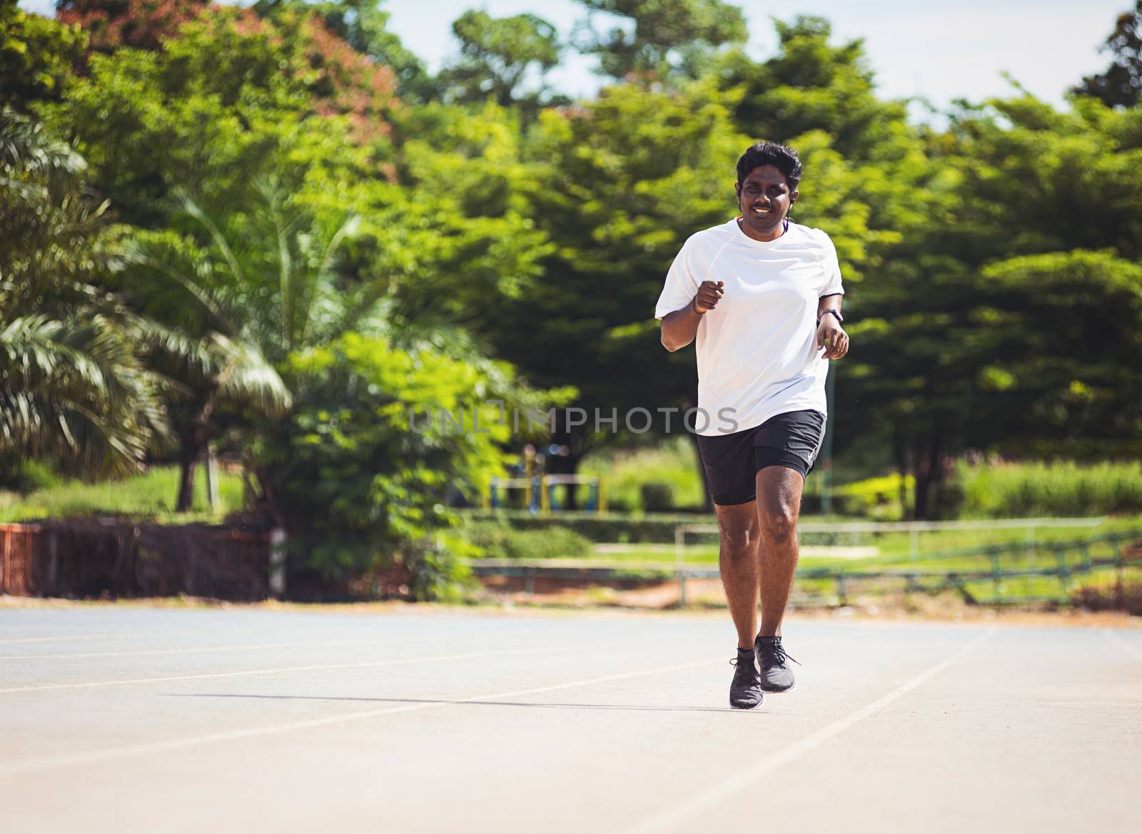 Asian young lifestyle athlete sport runner black man wear feet shoe active running training at the outdoor on the treadmill line road, healthy exercise workout