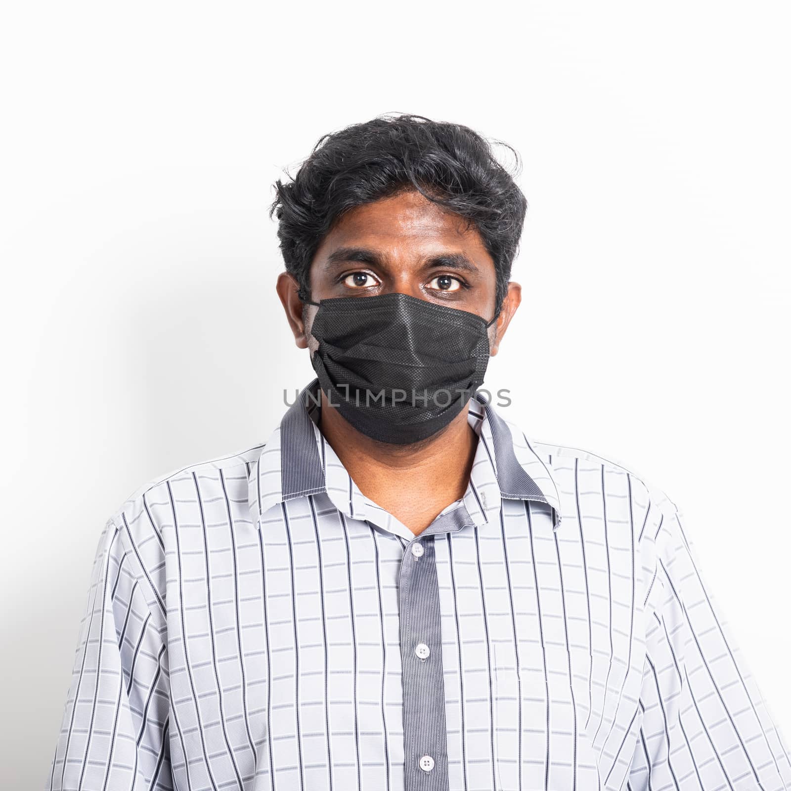 Asian happy portrait young black man wearing face mask protective from virus coronavirus epidemic or air pollution looking camera, studio shot isolated on white background, stop COVID-19 concept 