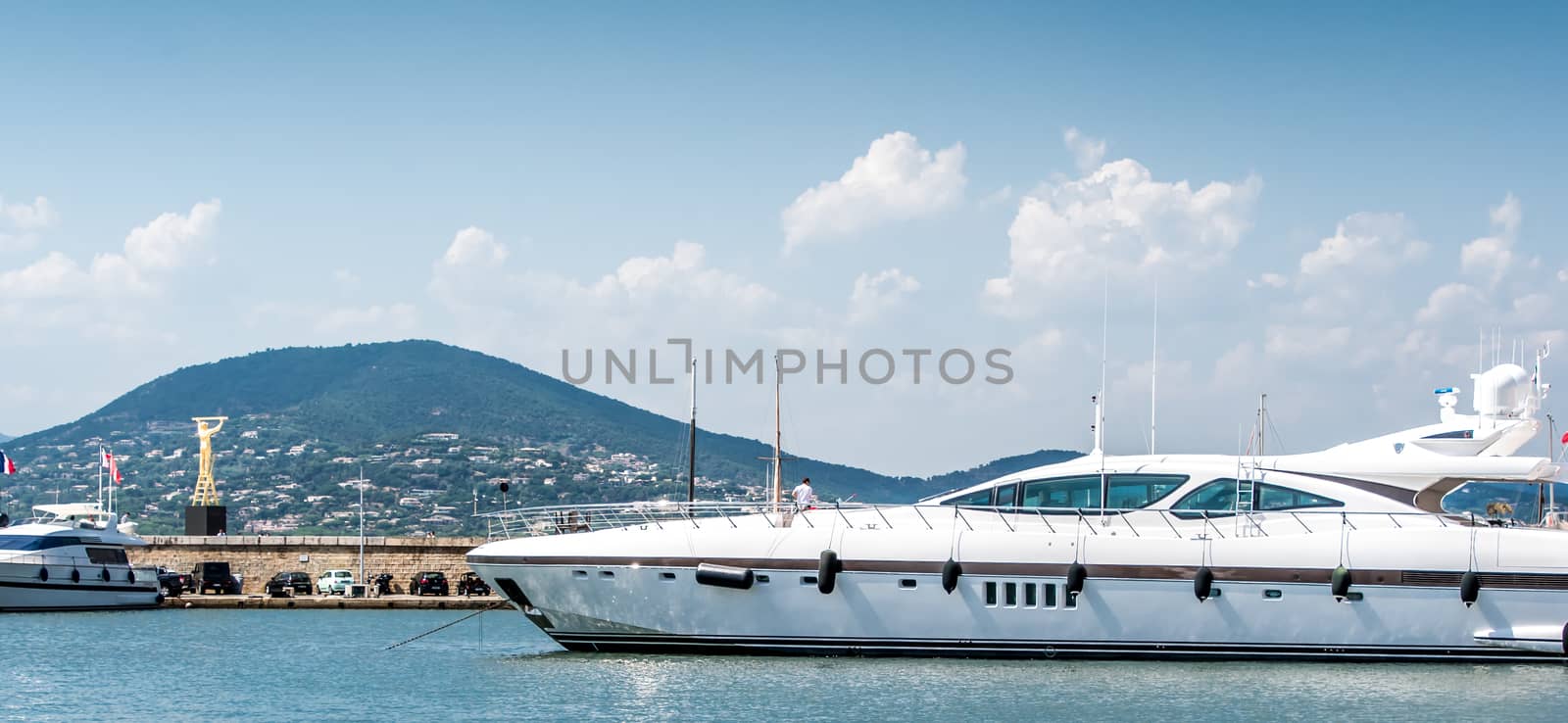 Saint-Tropez and its fishing port and its yachts in summer in France