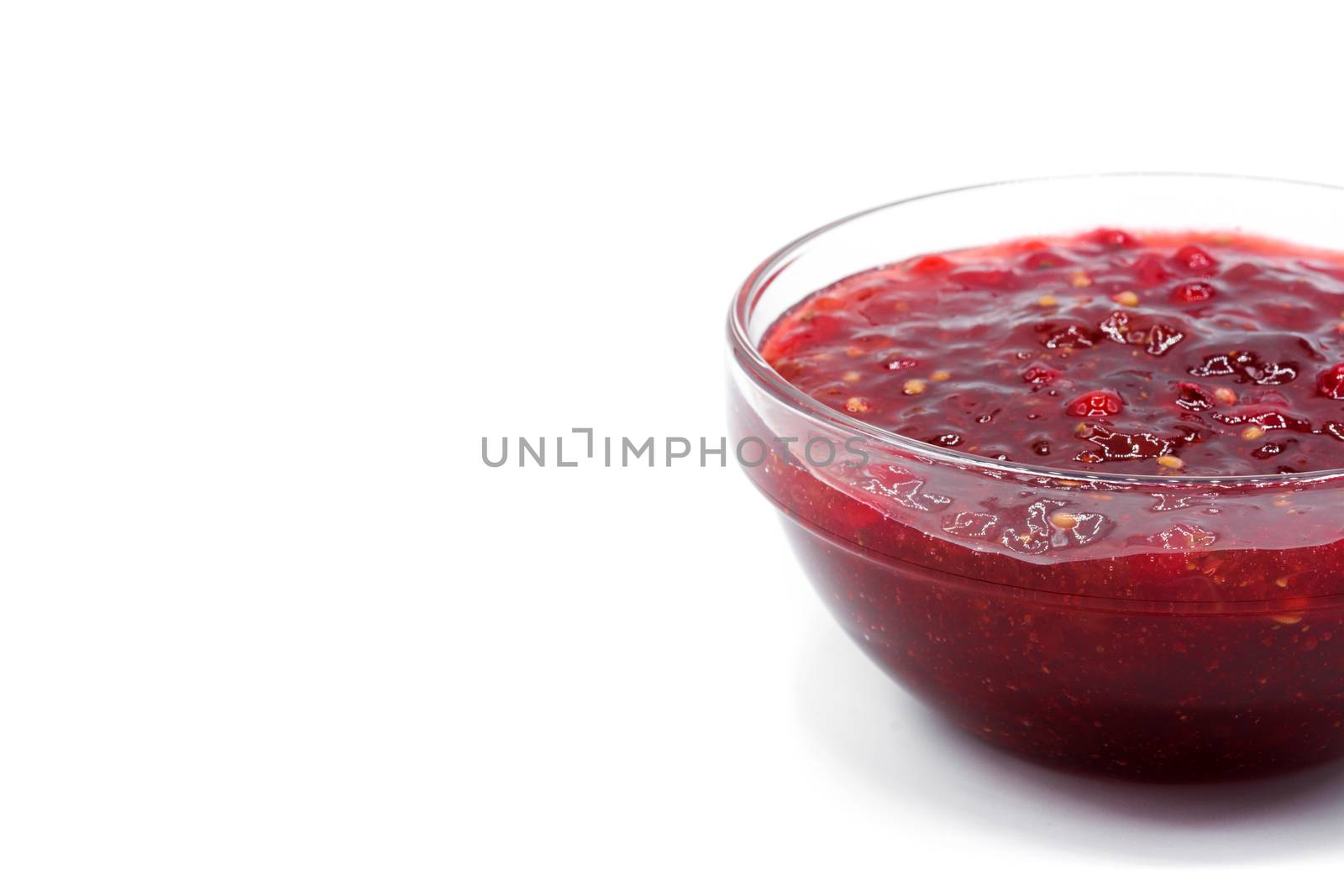 Cranberry sauce in bowl for Thanksgiving dinner isolated on white background by chandlervid85